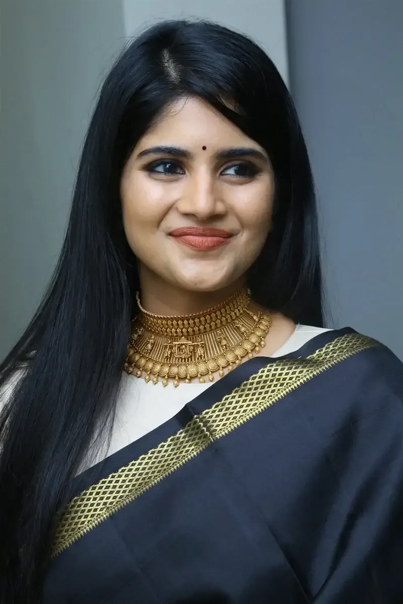 Megha Akash in Black Saree at Manu Charitra Telugu Movie Trailer Launch